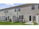 Backyard features a fenced yard, AC Unit, and back door entrance to the home at 176 Starlight St, Sanford, NC 27330