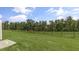 Spacious, fenced backyard with a well-maintained lawn, perfect for outdoor activities and relaxation at 176 Starlight St, Sanford, NC 27330