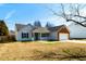 Charming single-story home with a well-manicured front yard and attached garage at 1930 Maple Sugar Ln, Fuquay Varina, NC 27526