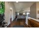 Inviting entryway featuring wood flooring and a view into the open-concept living space at 1930 Maple Sugar Ln, Fuquay Varina, NC 27526