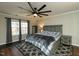 Spacious bedroom features a large bed, ceiling fan, and lots of natural light at 1930 Maple Sugar Ln, Fuquay Varina, NC 27526
