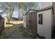 View of a storage shed in the backyard, next to the fence at 209 Tullich Way, Holly Springs, NC 27540