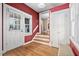 Welcoming foyer with hardwood floors and a view to the living spaces at 212 W University Dr, Chapel Hill, NC 27516