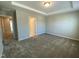 Bedroom with neutral colored walls, recessed lighting, and plush carpet at 219 Adobe Pl, Cary, NC 27519