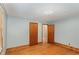 Charming bedroom features hardwood floors, natural light and closet space at 2246 Hillandale Rd, Durham, NC 27705