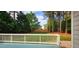 Well-maintained backyard featuring lush greenery and privacy fence at 2429 Falls River Ave, Raleigh, NC 27614
