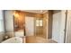 Bathroom featuring glass shower, soaking tub, and granite countertops at 2429 Falls River Ave, Raleigh, NC 27614
