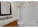 Bathroom with a granite countertop, vanity, and a shower-tub combo at 2505 Egypt Mountain Rd, Kittrell, NC 27544