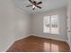 Bedroom featuring hardwood floors and a window for natural light at 2505 Egypt Mountain Rd, Kittrell, NC 27544