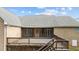 Exterior deck and screened-in porch attached to a brick home, perfect for relaxing at 2505 Egypt Mountain Rd, Kittrell, NC 27544