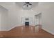 Spacious living room with high ceilings, fireplace, and gleaming hardwood floors at 2505 Egypt Mountain Rd, Kittrell, NC 27544