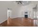 Spacious living room features fireplace, hardwood floors, and abundant natural light at 2505 Egypt Mountain Rd, Kittrell, NC 27544