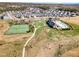 Aerial view of community with a tennis court, pool, clubhouse and walking paths at 251 North Crest Dr, Chapel Hill, NC 27517