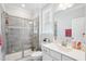 Modern bathroom featuring a glass-enclosed shower, sleek fixtures, and a vanity for a clean look at 251 North Crest Dr, Chapel Hill, NC 27517