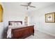 Neutral bedroom with a ceiling fan and ample natural light, creating a serene atmosphere at 251 North Crest Dr, Chapel Hill, NC 27517