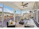 Relaxing screened-in porch featuring comfortable seating and a ceiling fan, perfect for enjoying the outdoors at 251 North Crest Dr, Chapel Hill, NC 27517