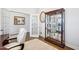 Elegant office features hardwood floors, glass door, and a beautiful display cabinet at 251 North Crest Dr, Chapel Hill, NC 27517
