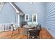 An inviting back deck with patio furniture perfect for outdoor gatherings and relaxation at 2601 Forestville Rd, Wake Forest, NC 27587