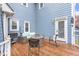 An inviting back deck with patio furniture perfect for outdoor gatherings and relaxation at 2601 Forestville Rd, Wake Forest, NC 27587
