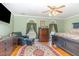 Bedroom featuring an area rug, wood floors, and plenty of space for furniture at 2601 Forestville Rd, Wake Forest, NC 27587
