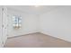 Bright bedroom with carpeted floor and a window that invites natural light and showcases the outdoors at 2776 Jordan Ct, Creedmoor, NC 27522