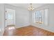 Bright dining room with hardwood floors and a large window with natural light at 2776 Jordan Ct, Creedmoor, NC 27522