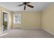 Bedroom featuring neutral paint, carpet flooring, window, and bathroom access at 3001 Blanche Dr, Burlington, NC 27215