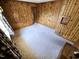 Corner of a wood-paneled bedroom showing window and closet access at 3015 Nc Hwy 87 South, Graham, NC 27253