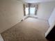Bright bedroom has neutral color palette and is ready for customization at 3015 Nc Hwy 87 South, Graham, NC 27253