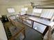 Spacious garage with a ramp, cabinets, and windows for ample light and storage at 3015 Nc Hwy 87 South, Graham, NC 27253