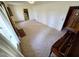 Carpeted living room with fireplace, piano, and access to other rooms at 3015 Nc Hwy 87 South, Graham, NC 27253