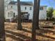 Well-maintained backyard with a deck for outdoor relaxation, nestled in a treed lot at 307 Kellyridge Dr, Apex, NC 27502