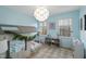 Light blue bedroom with built in bed and storage, large windows and plush rug at 307 Kellyridge Dr, Apex, NC 27502