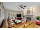 Open living room with a fireplace and stylish furniture arrangement at 307 Kellyridge Dr, Apex, NC 27502