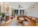 Spacious living room with fireplace, plush seating, and colorful accents at 307 Kellyridge Dr, Apex, NC 27502