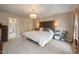 Comfortable main bedroom featuring neutral tones and ample space at 307 Kellyridge Dr, Apex, NC 27502