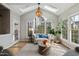 Airy sunroom with a skylight, perfect for relaxation and enjoying nature at 307 Kellyridge Dr, Apex, NC 27502