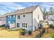 Exterior of home featuring a patio, fenced yard, and manicured landscaping at 3162 Retama Run # 231, Apex, NC 27562