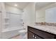 Bathroom featuring a tub/shower, granite counters, and a dark wood vanity at 3162 Retama Run # 231, Apex, NC 27562