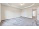 Light-filled bedroom featuring plush carpeting and neutral paint, ready for personalization at 3162 Retama Run # 231, Apex, NC 27562