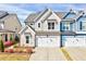 Charming home featuring a two-car garage, tidy landscaping, and Craftsman-style architecture at 3162 Retama Run # 231, Apex, NC 27562