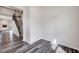 Spacious living area with stairs and wood-look flooring at 3162 Retama Run # 231, Apex, NC 27562