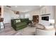 Inviting living room with fireplace, comfortable seating, and wood-look flooring at 3162 Retama Run # 231, Apex, NC 27562