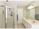 Bright bathroom with dual sinks, a glass-enclosed shower, and plenty of counter space at 3313 Ventura Cir, Wake Forest, NC 27587