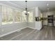 Bright kitchen with a dining nook with lots of sunlight and stainless steel appliances at 3313 Ventura Cir, Wake Forest, NC 27587