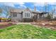 The home's exterior boasts a lush lawn and meticulous landscaping, enhancing its curb appeal at 3417 Pea Ridge Rd, New Hill, NC 27562