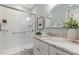 Modern bathroom with glass enclosed shower, granite vanity, and white subway tiles at 3417 Pea Ridge Rd, New Hill, NC 27562