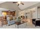 Inviting living room with open layout, hardwood floors, and easy access to dining and kitchen areas at 3417 Pea Ridge Rd, New Hill, NC 27562