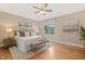 Spacious main bedroom with a trey ceiling and comfortable seating at 3417 Pea Ridge Rd, New Hill, NC 27562