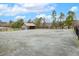 Outdoor paddock with wooden fencing and gravel, providing ample space at 3417 Pea Ridge Rd, New Hill, NC 27562